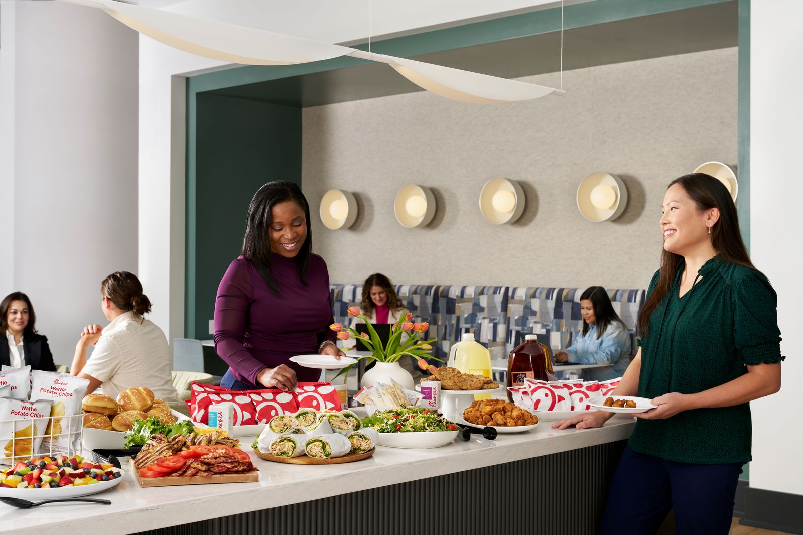Chick-fil-A catering spread on an office table